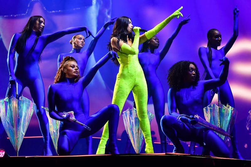 Dua Lipa Stuns in a Custom Balenciaga Lingerie Suit on Stage