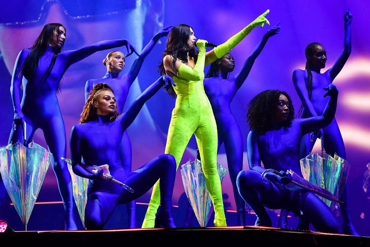 Dua Lipa Stuns in a Custom Balenciaga Lingerie Suit on Stage