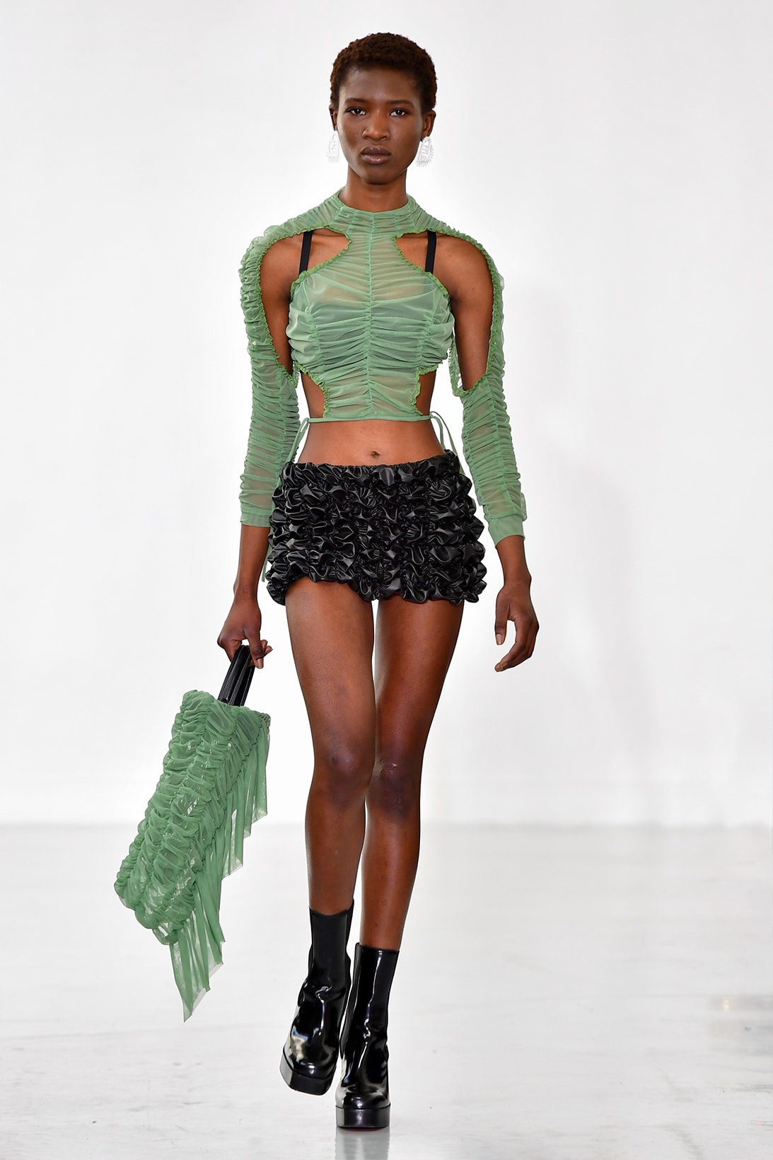 Ester Manas Fall Winter Collection Size Inclusivity Cut-Outs Fashion Week Runway Show Photos Top Skirt Handbag Black Green