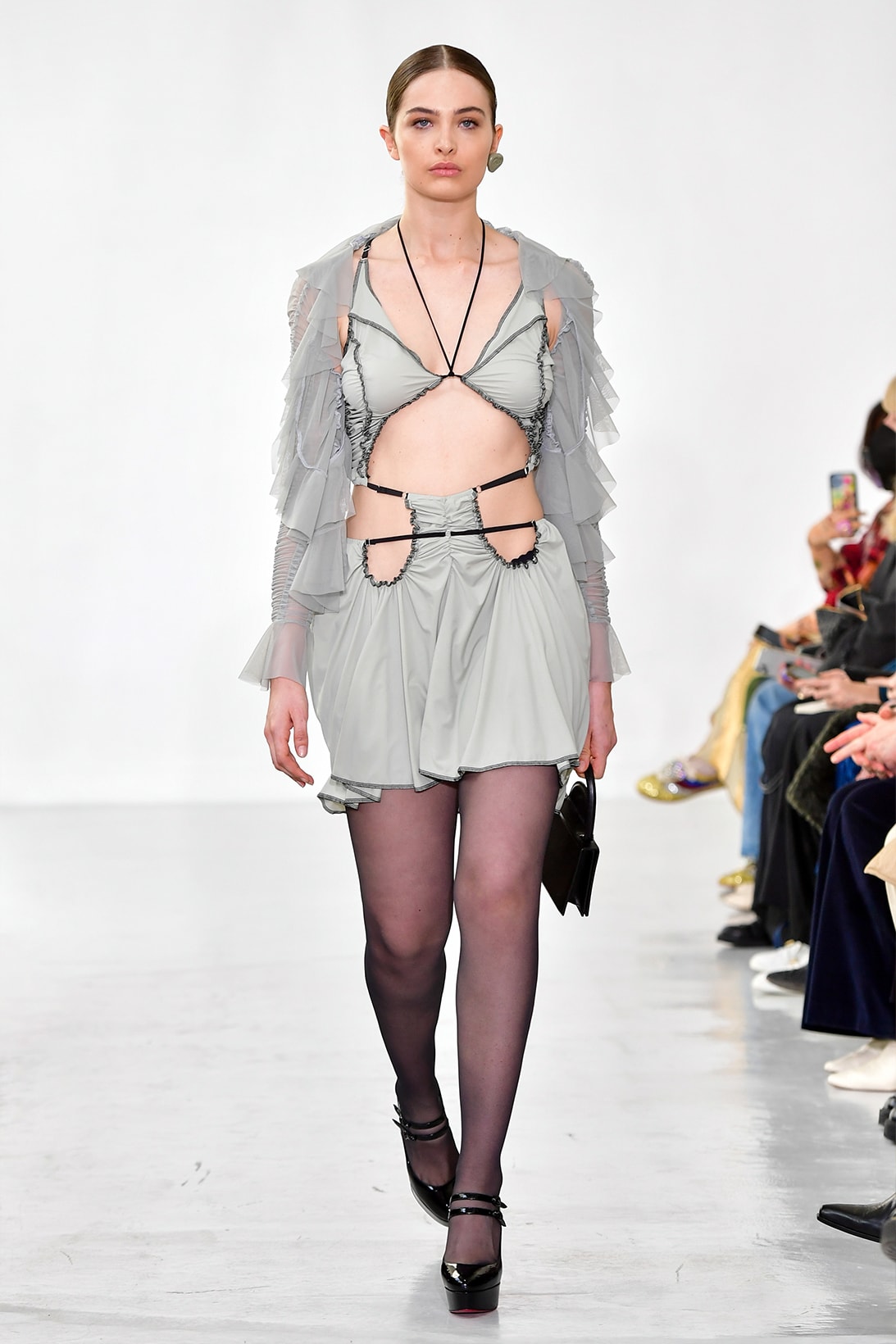 Ester Manas Fall Winter Collection Size Inclusivity Cut-Outs Fashion Week Runway Show Photos Gray Ruffled Dress