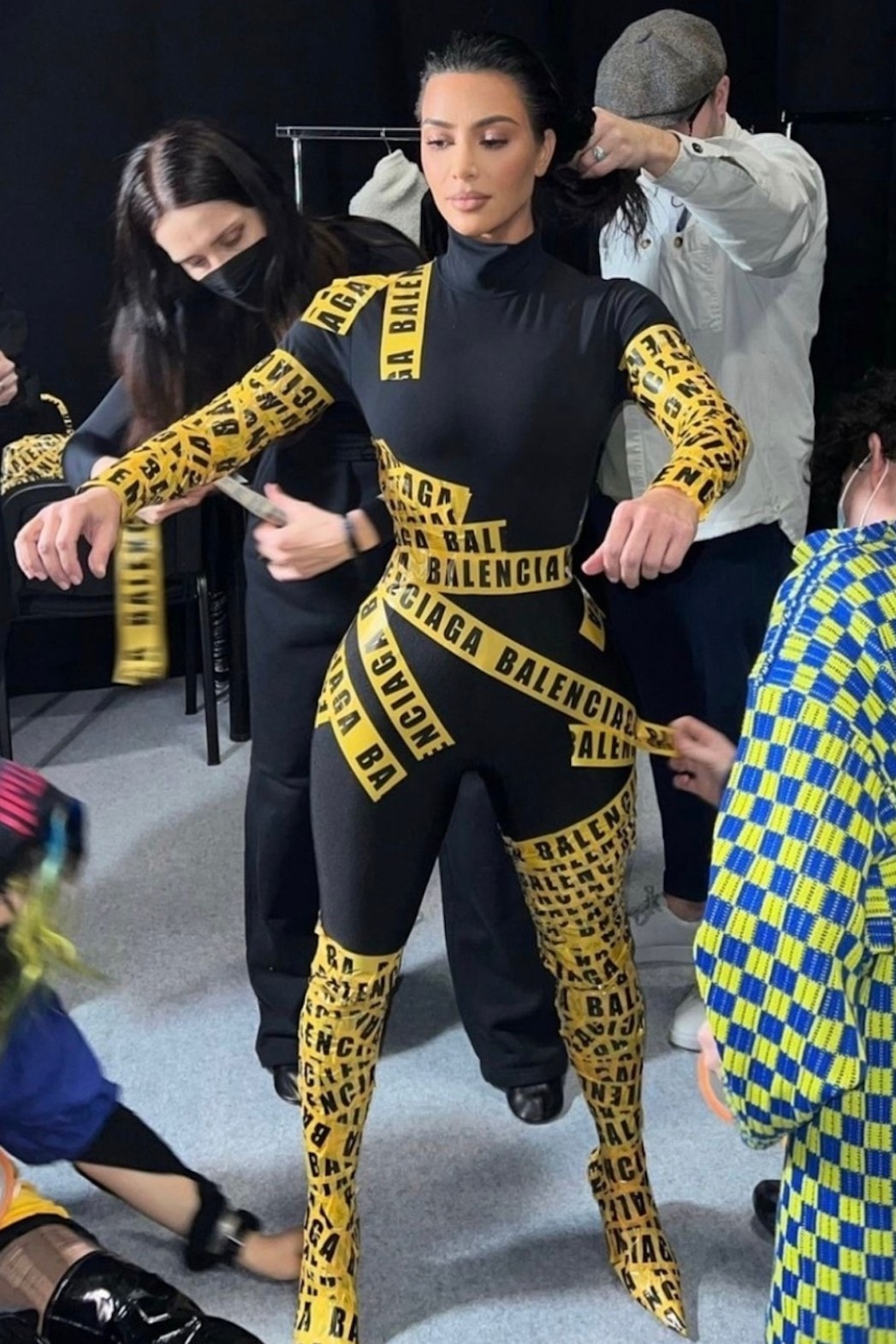 kim kardashian balenciaga yellow caution tape paris fashion week 