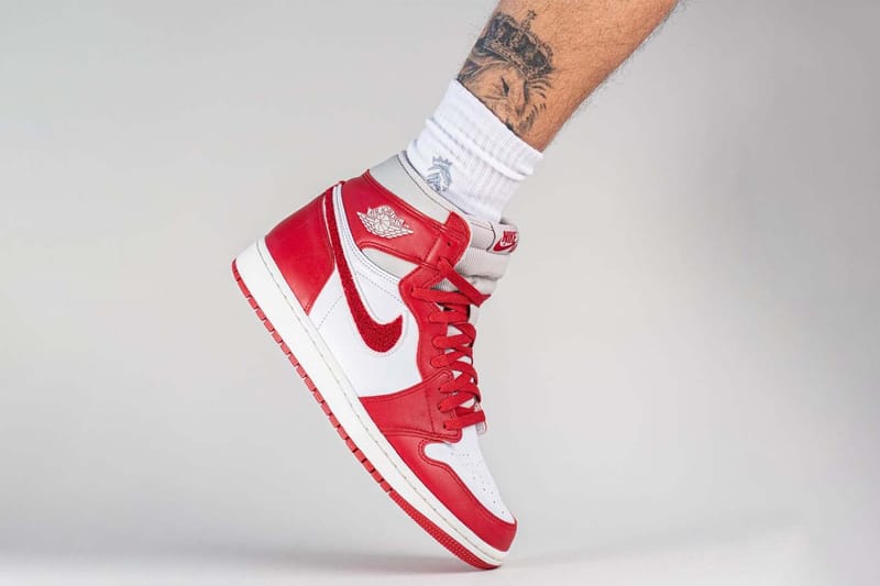 jordan 1 varsity red on feet