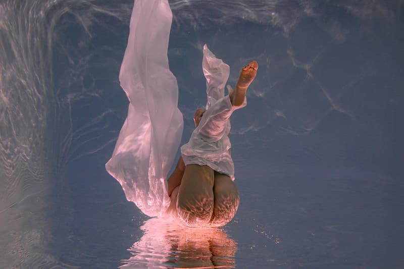 Woman Swimming Underwater