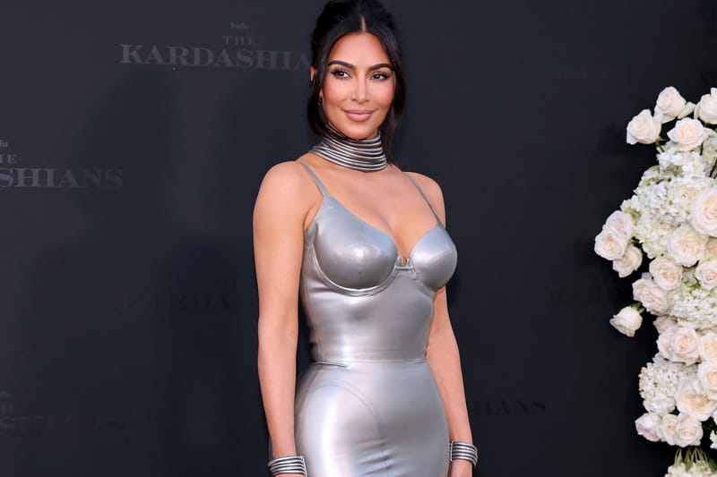 Kim Kardashian Stuns in Metallic Silver Dress at 'The Kardashians' Premiere