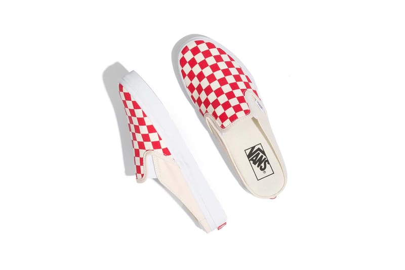 blue checkerboard vans slip on