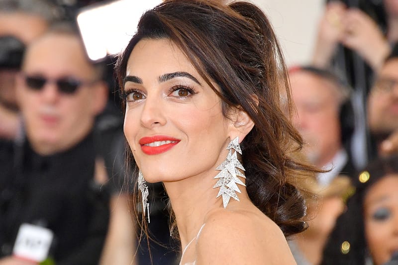 Amal Clooney Switches Out Her Signature "Espresso Brown" Hair Color for a "Hot Chocolate" Winter Update
