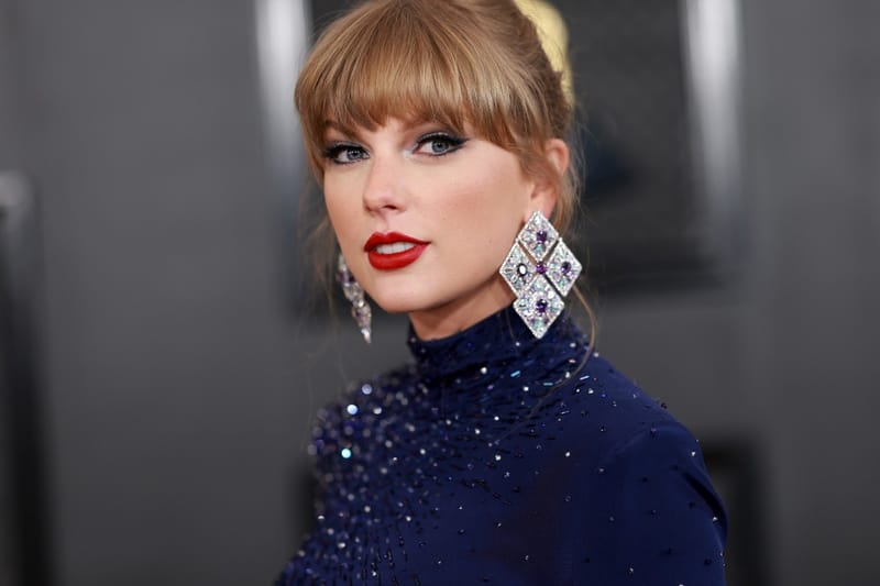 The Origin to Taylor Swift's Classic Red Lip Finally Gets Explained