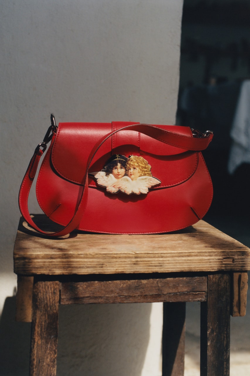 fiorucci fall campaign italy collection denim cherub angel print red bag