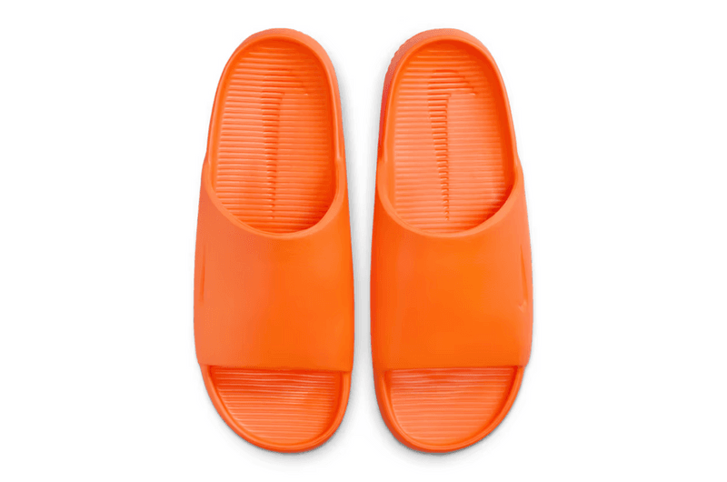 nike calm slide orange slip on shoe 