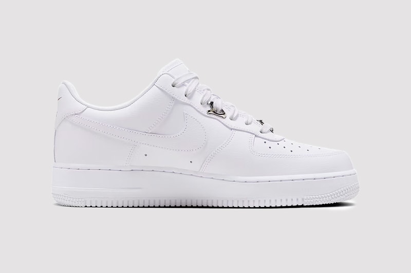 Metallic Silver Swooshes Decorate This Nike Air Force 1 Low