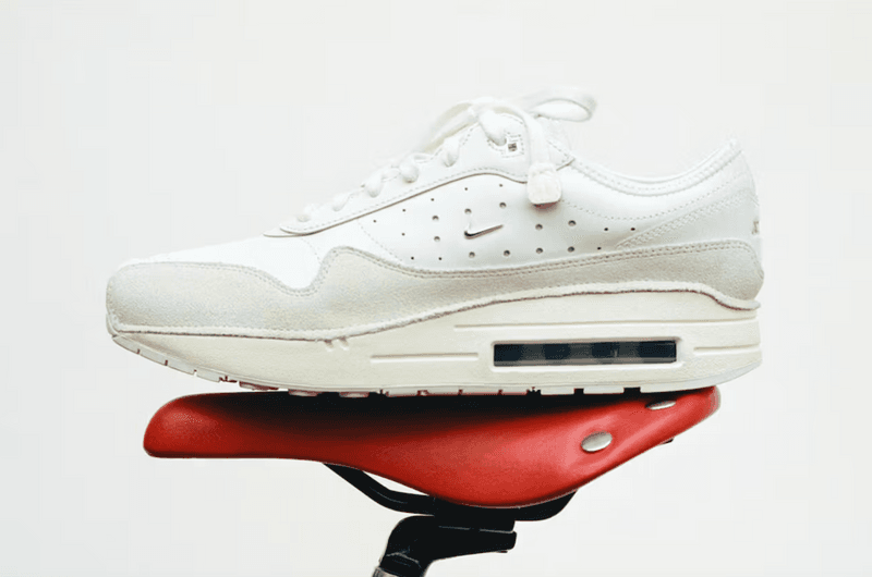 jacquemus nike sportswear clothing swoosh bags navy blue red tops skirts zip woman model