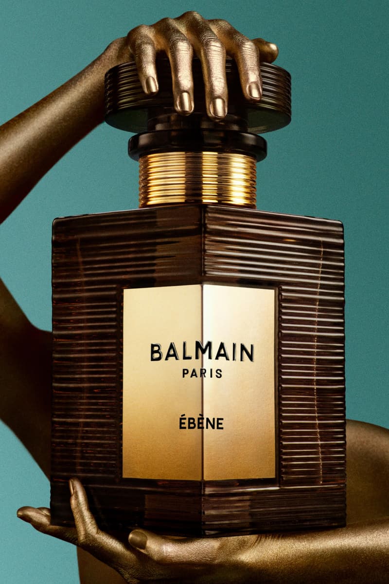 balmain beauty, fragrance, soo joo park model with red hair and bottle, olivier rousteing