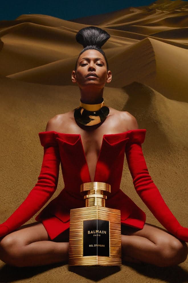 balmain beauty, fragrance, soo joo park model with red hair and bottle, olivier rousteing