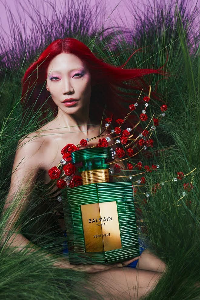 balmain beauty, fragrance, soo joo park model with red hair and bottle, olivier rousteing