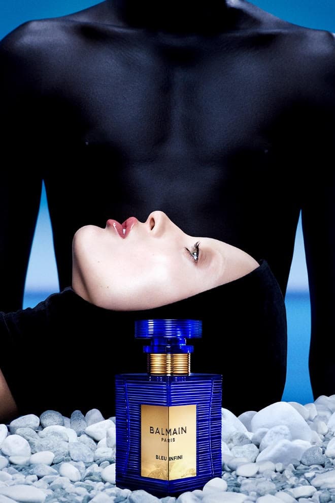 balmain beauty, fragrance, soo joo park model with red hair and bottle, olivier rousteing