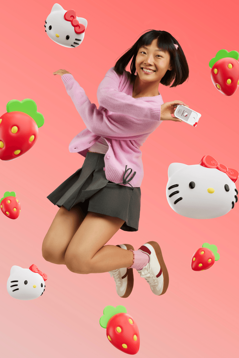 woman with bob surrounded by hello kitty sanrio touchland hand sanitizers, beauty, 50th anniversary