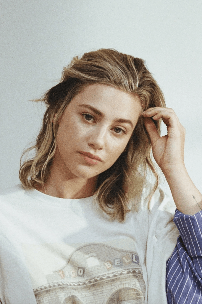 lili reinhart in the sun poolside, personal day, skincare line, acne-prone skin