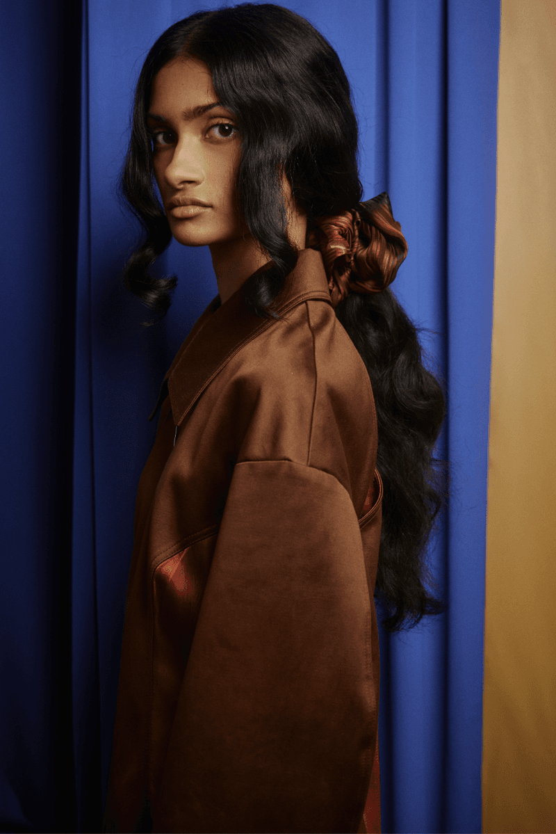 two women and one man wearing hair scrunchies, accessories, haircare, fashion