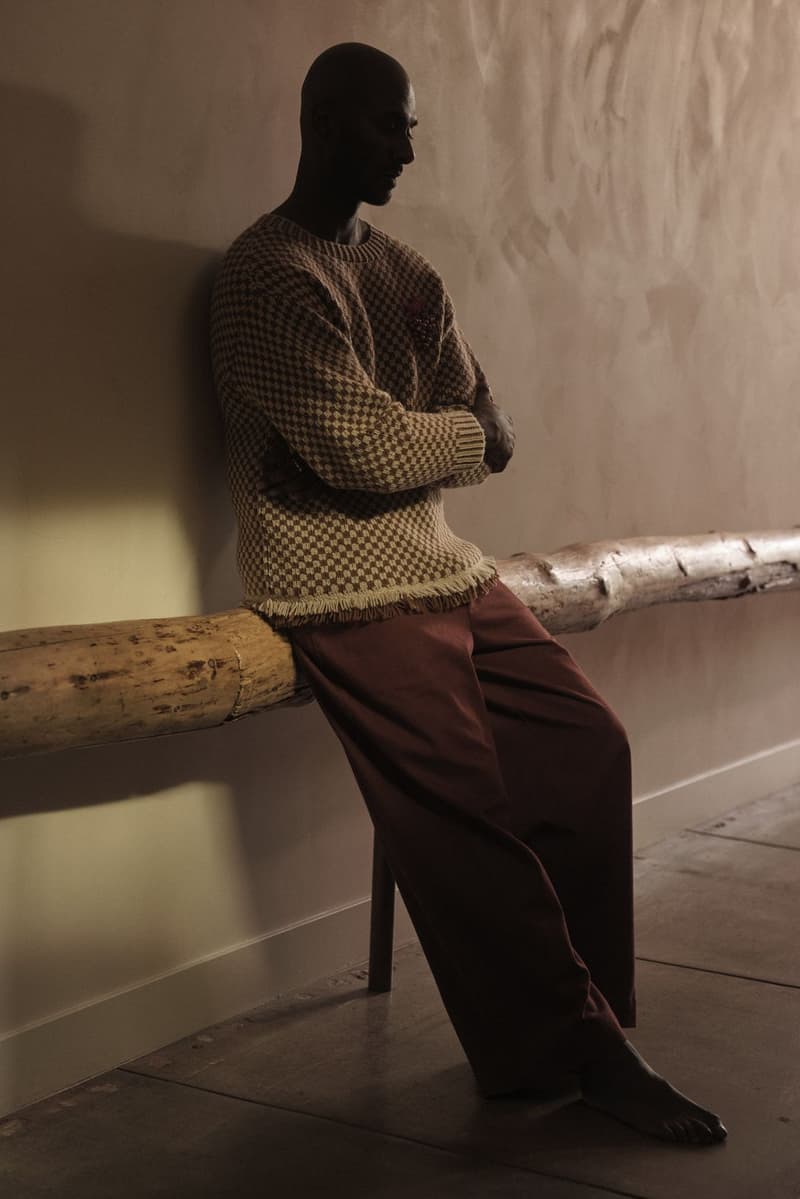 founder of open manoj dias posing against a wall, meditation and breathwork app, wellness