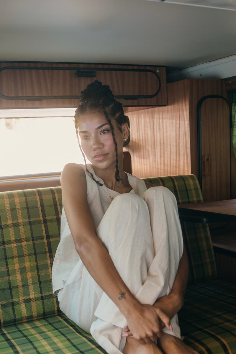 jhene aiko posing in the back of a car, skincare, cbd, body care, jhenetics