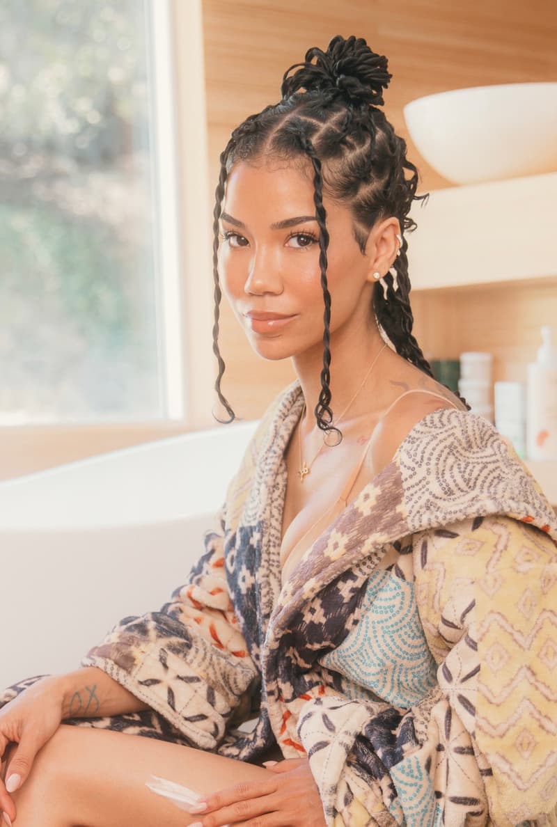 jhene aiko posing in the back of a car, skincare, cbd, body care, jhenetics