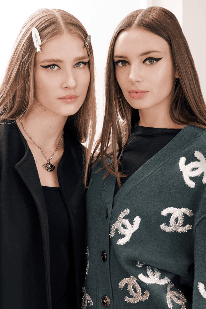two women with black eyeliner makeup, chanel beauty, fashion
