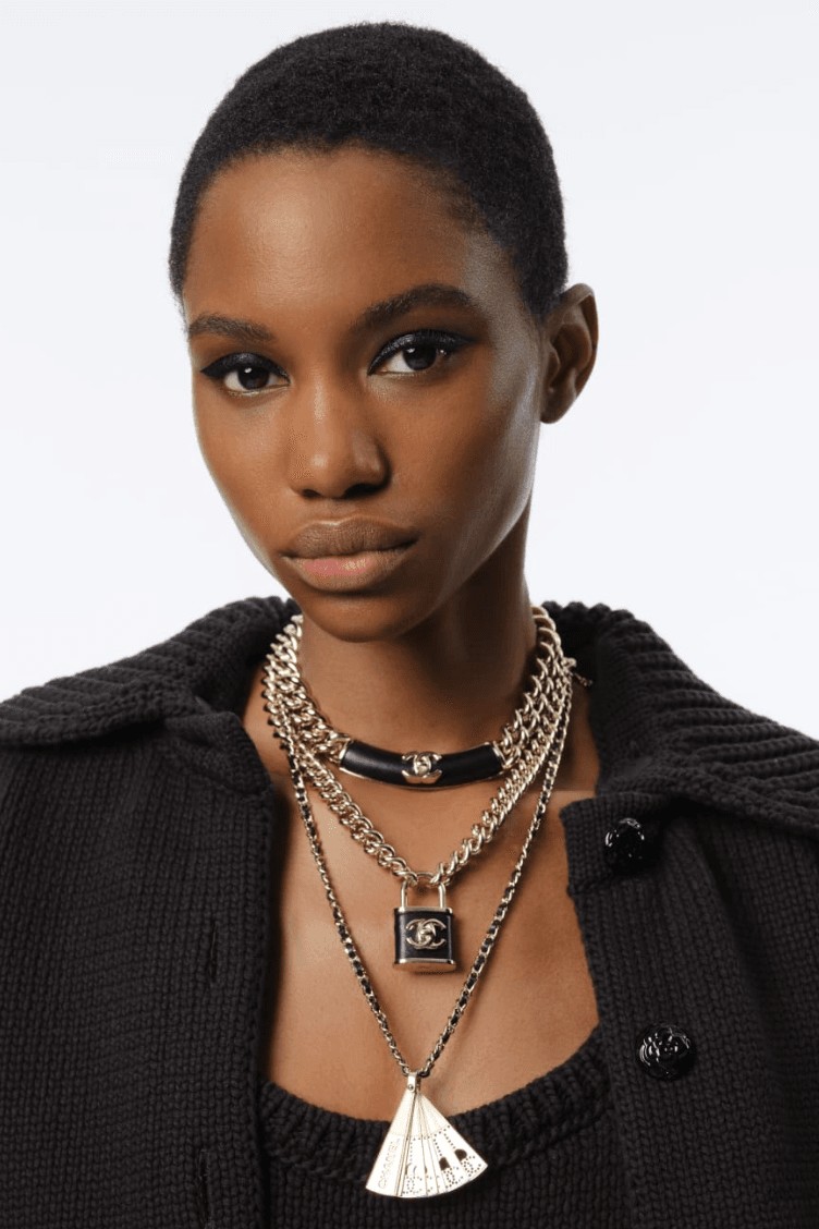 two women with black eyeliner makeup, chanel beauty, fashion