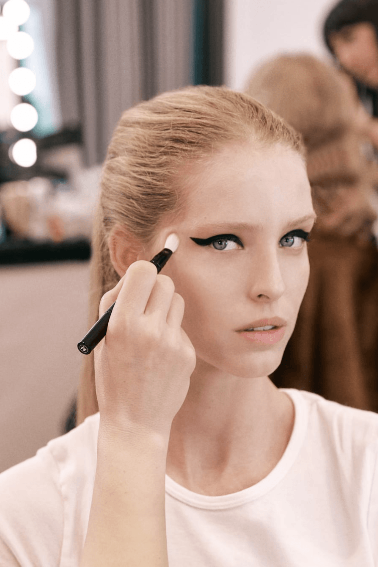 two women with black eyeliner makeup, chanel beauty, fashion