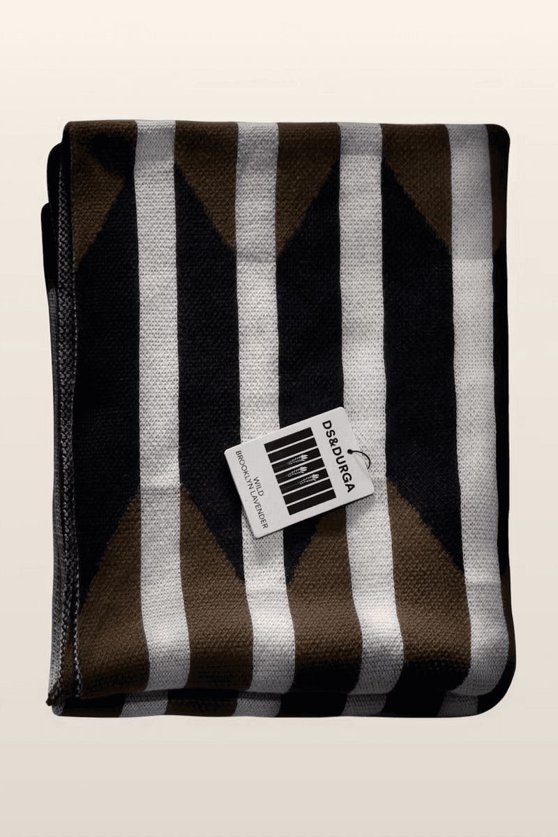 woman wrapped up in blanket, brown throw, homeware, fragrance, perfume, cotton incorporated, d.s. & durga