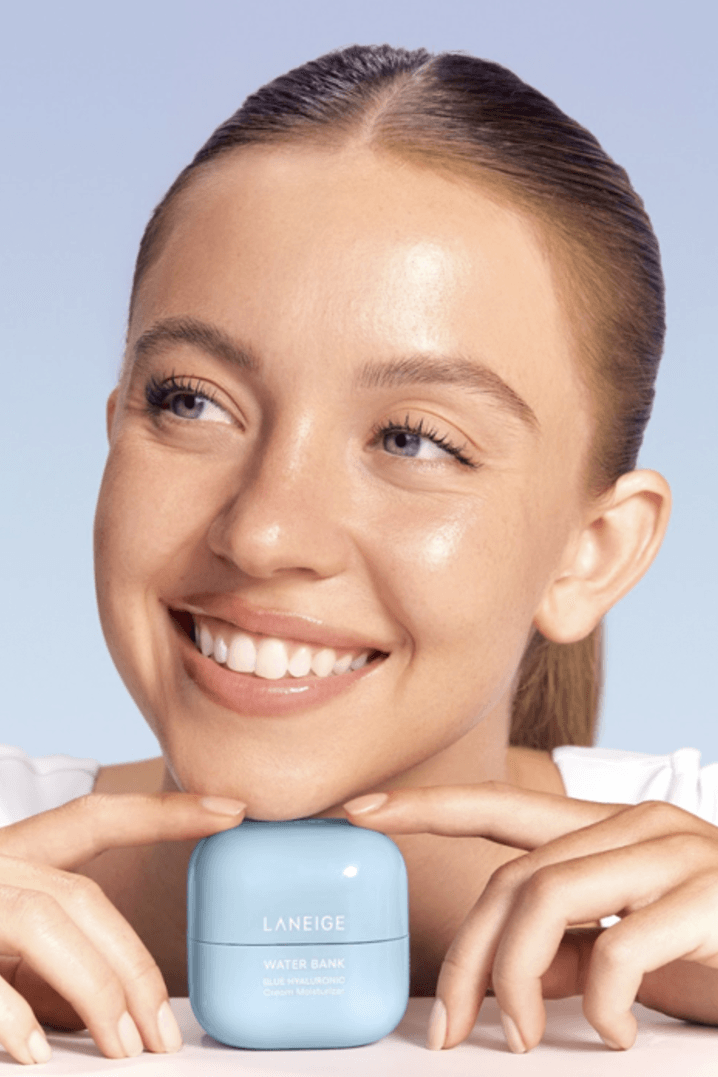 sydney sweeney holding up the water bank moisturizer from laneige, skincare, k-beauty