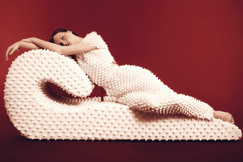 chet lo designer furniture rankin edition woman naked lying textured sofa white red