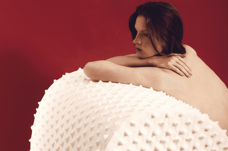 chet lo designer furniture rankin edition woman naked lying textured sofa white red