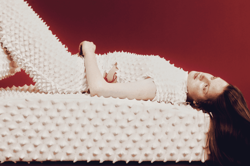 chet lo designer furniture rankin edition woman naked lying textured sofa white red