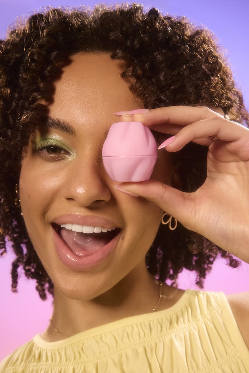 three women with colorful eyeshadow, posing with daise perfume bottles, fragrance, mood boosters, beauty