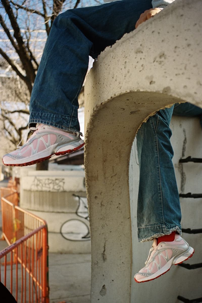 salomon sandy liang pink red silver sneakers trainers girl building balcony city