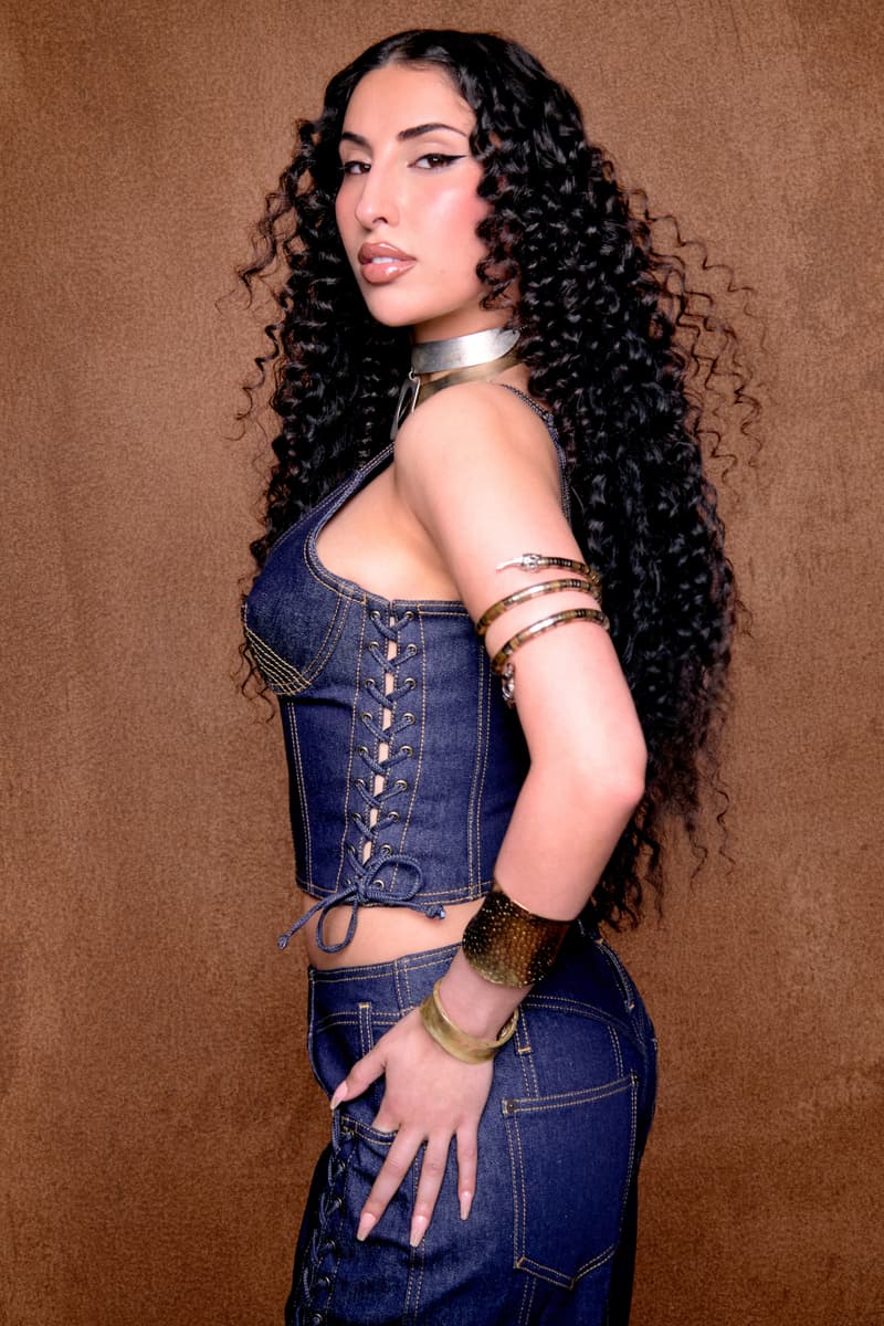 photo of zeina with curly long hair and denim top, arab artist, nyxtape, nyx cosmetics, makeup, beauty