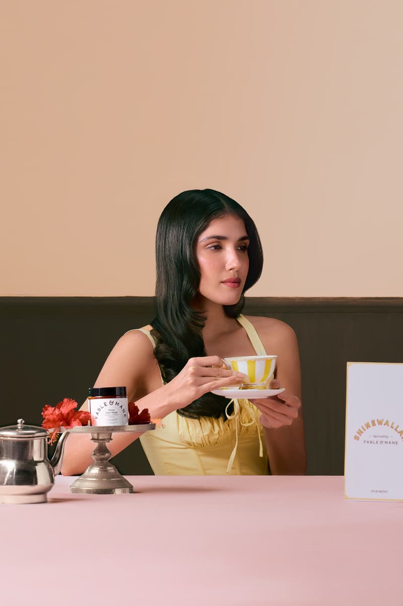 woman drinking chai with fable & mane shine hair mask, haircare, ayurvedic beauty