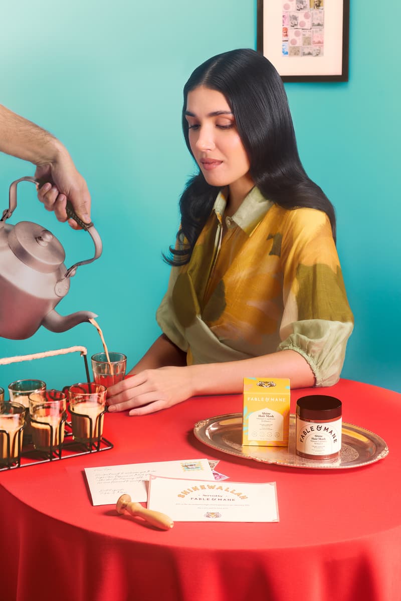 woman drinking chai with fable & mane shine hair mask, haircare, ayurvedic beauty