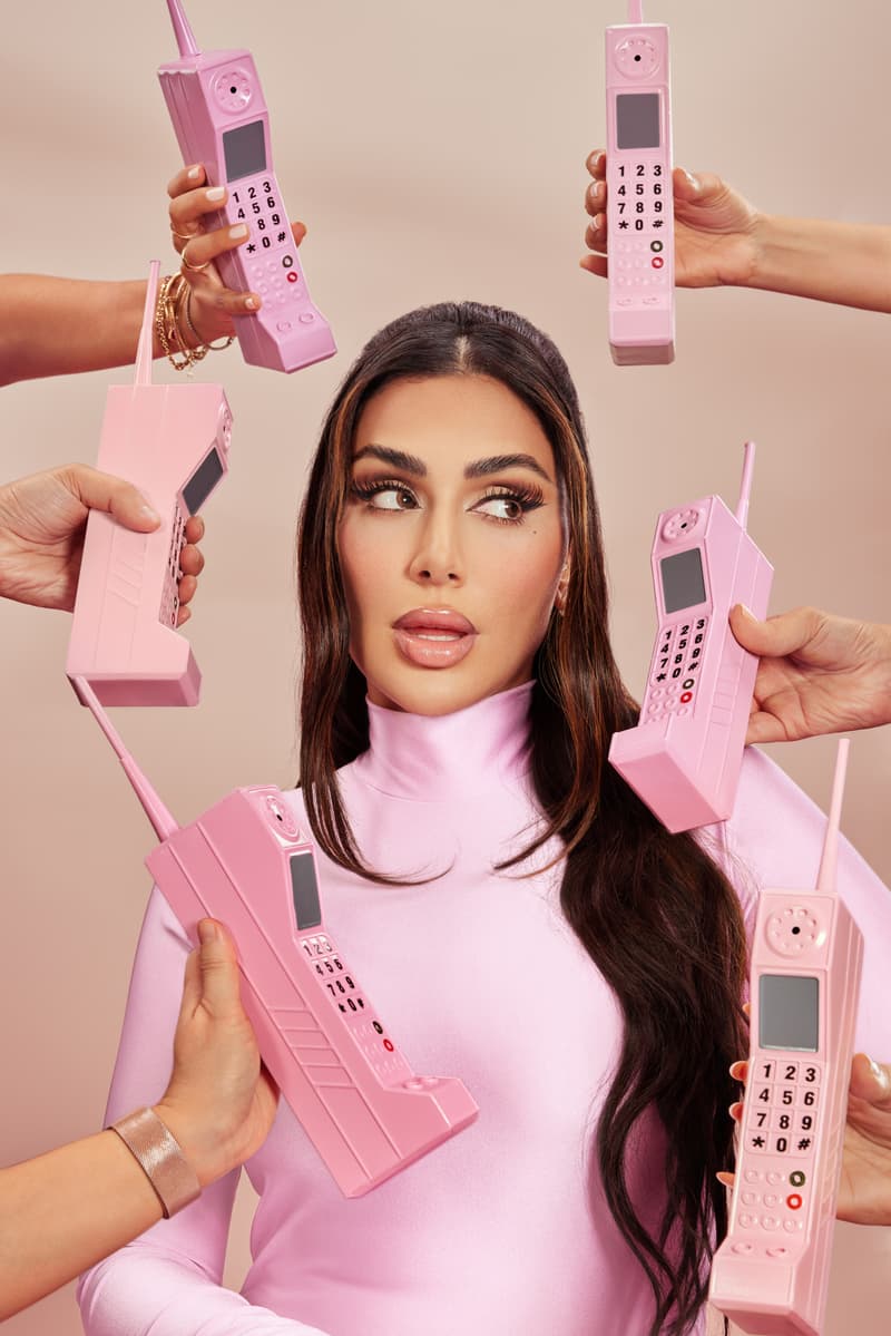 huda kattan wearing phones as hair rollers, huda hotline podcast, beauty, makeup