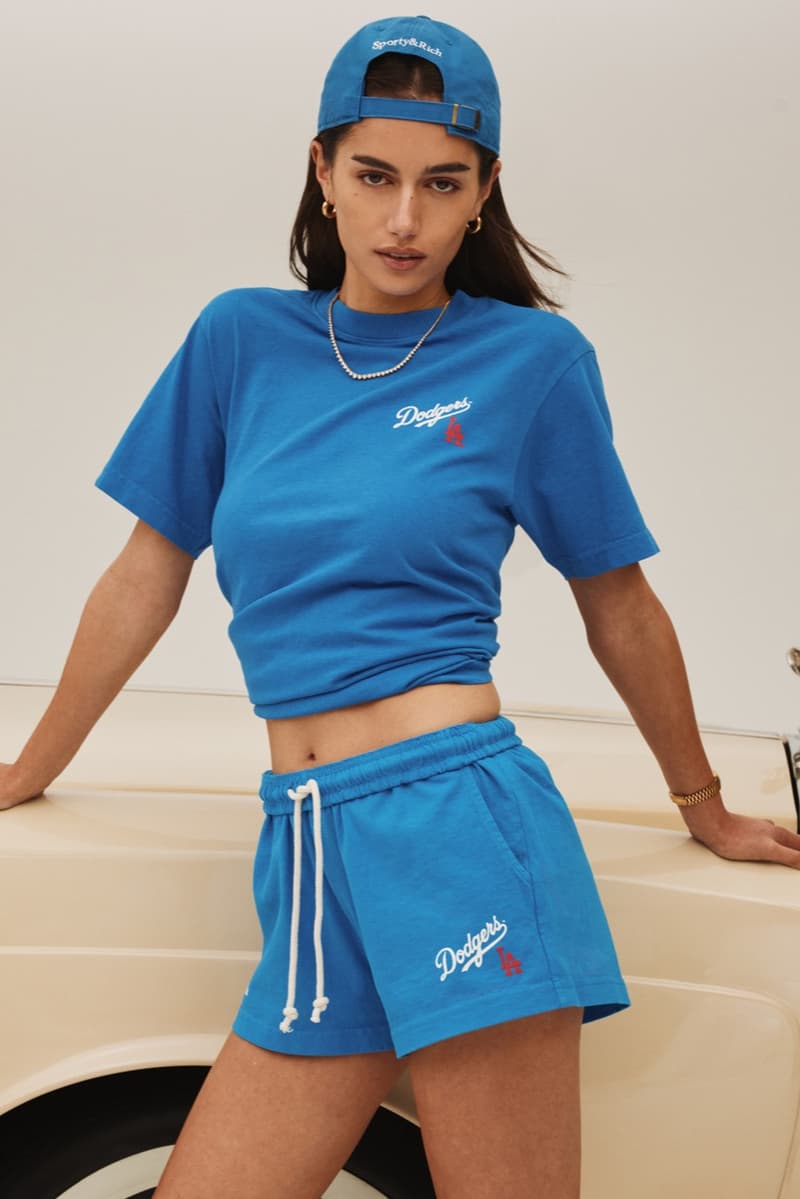 sporty rich los angeles dodgers baseball collection shorts caps sweatshirts pants girl laying on car