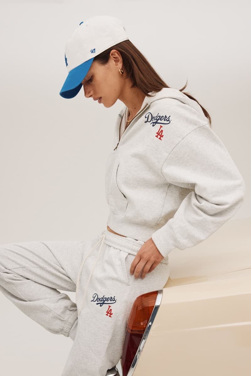 sporty rich los angeles dodgers baseball collection shorts caps sweatshirts pants girl laying on car