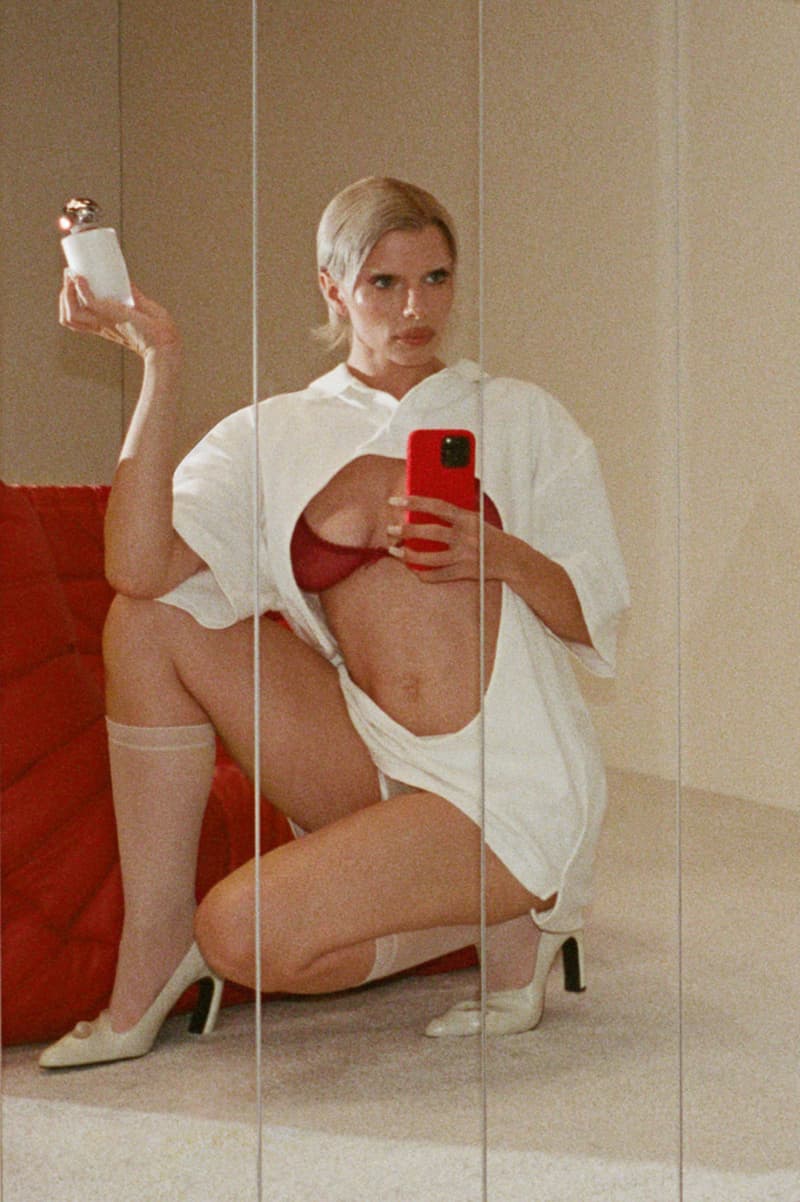 julia fox posing with mienne products on white bed, luxury skincare brand