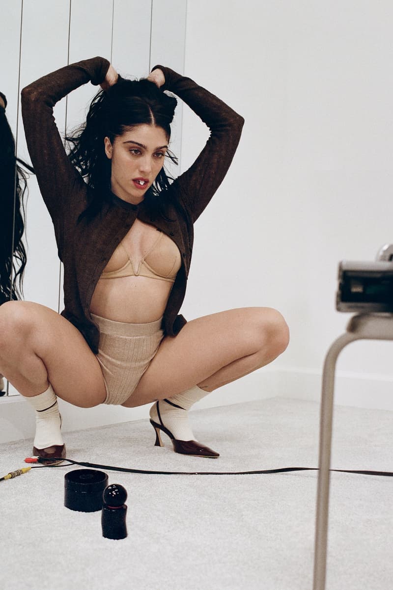 julia fox posing with mienne products on white bed, luxury skincare brand