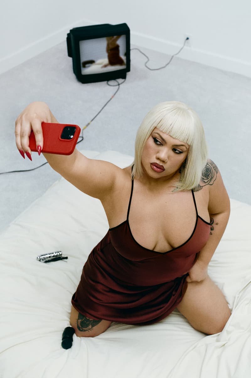 julia fox posing with mienne products on white bed, luxury skincare brand