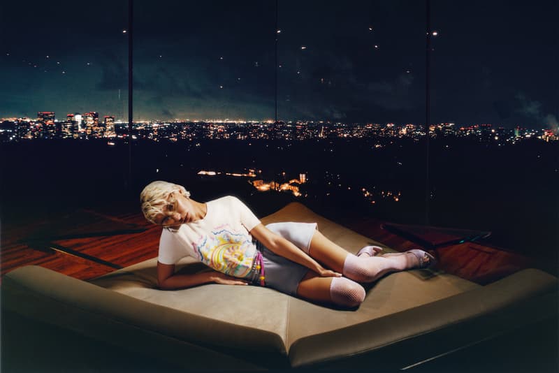 iris law, casablanca, green tights, girl, laying on sofa, white dress, hotel