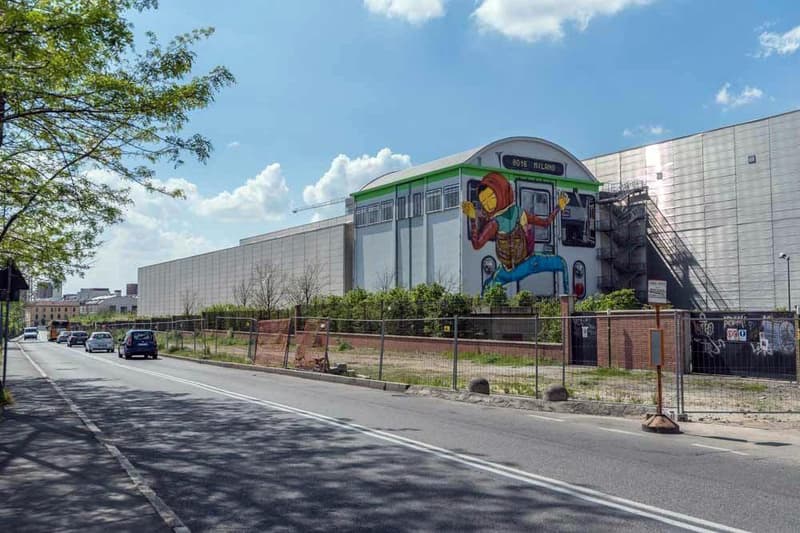 双子ストリートアーティストデュオ Os Gemeos による大きな壁画がミラノの街に出現