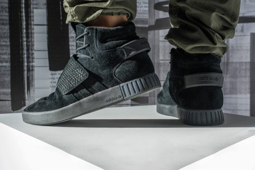 adidas が Foot Locker 限定のストラップ付き Tubular Invader “Triple Black” をドロップ
