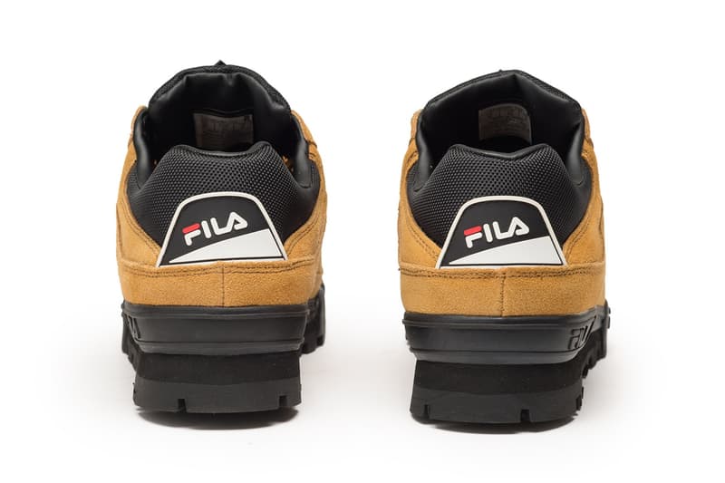 FILA が伝統のトレッキングモデル Trailblazer からスエード仕様の新作をドロップ 90年代のUKレイブシーンで絶大な人気を誇るなど、コアなヘッズの購買意欲を駆り立てる一足