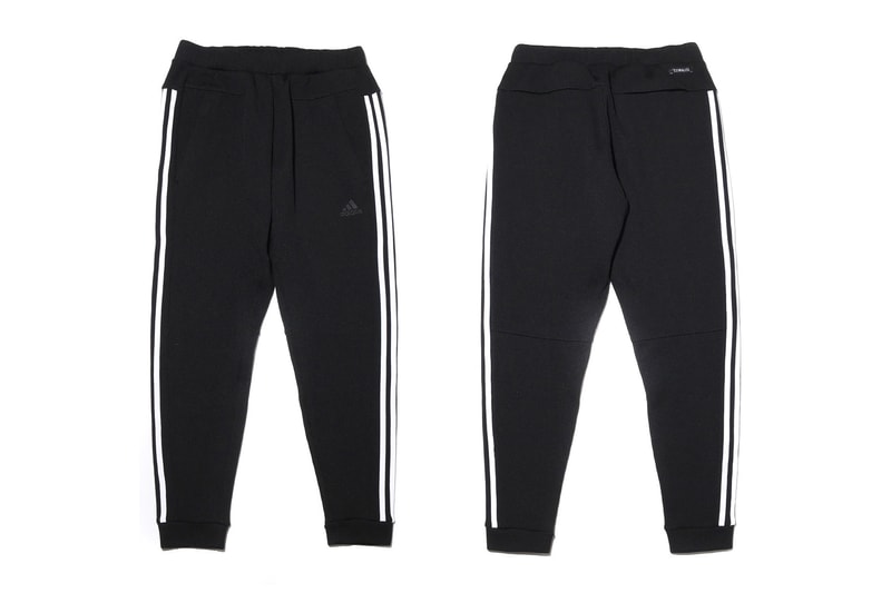 アトモスとアディダスによる初コラボアイテムとしてセットアップが登場 atmos と adidas による初コラボアイテムとしてフーディー＆パンツからなるセットアップが登場