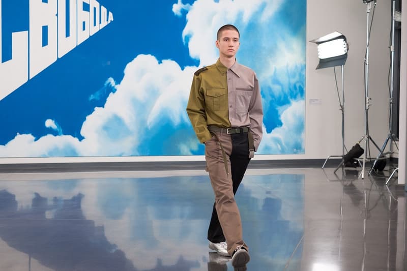 独自のスタイルにミリタリー要素を掛け合わせた Gosha Rubchinskiy 2018年秋冬コレクションを一挙プレイバック トレンドを色濃く反映したスタイルのみならずロシアヘッズたちの髪型や表情にも注目 ロシア エカテリンブルク Gosha Rubchinskiy ゴーシャ ラブチンスキー Burberry バーバリー Levi’s®︎ リーバイス Dr.Martens ドクターマーチン adidas アディダス ドロップショルダー オーバーサイズ コート類 スウェット カラーブロッキング フライトジャケット ワークシャツ HYPEBEAST ハイプビースト